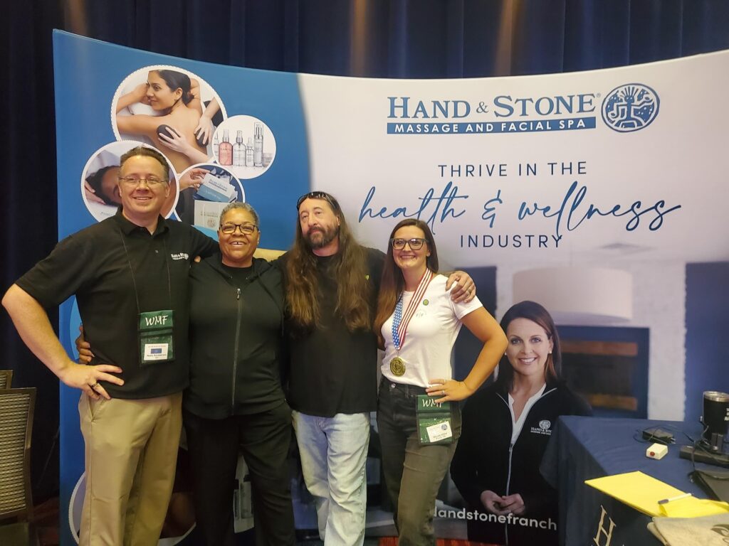 Four Hand & Stone massage therapists at 2023 American Massage Championship