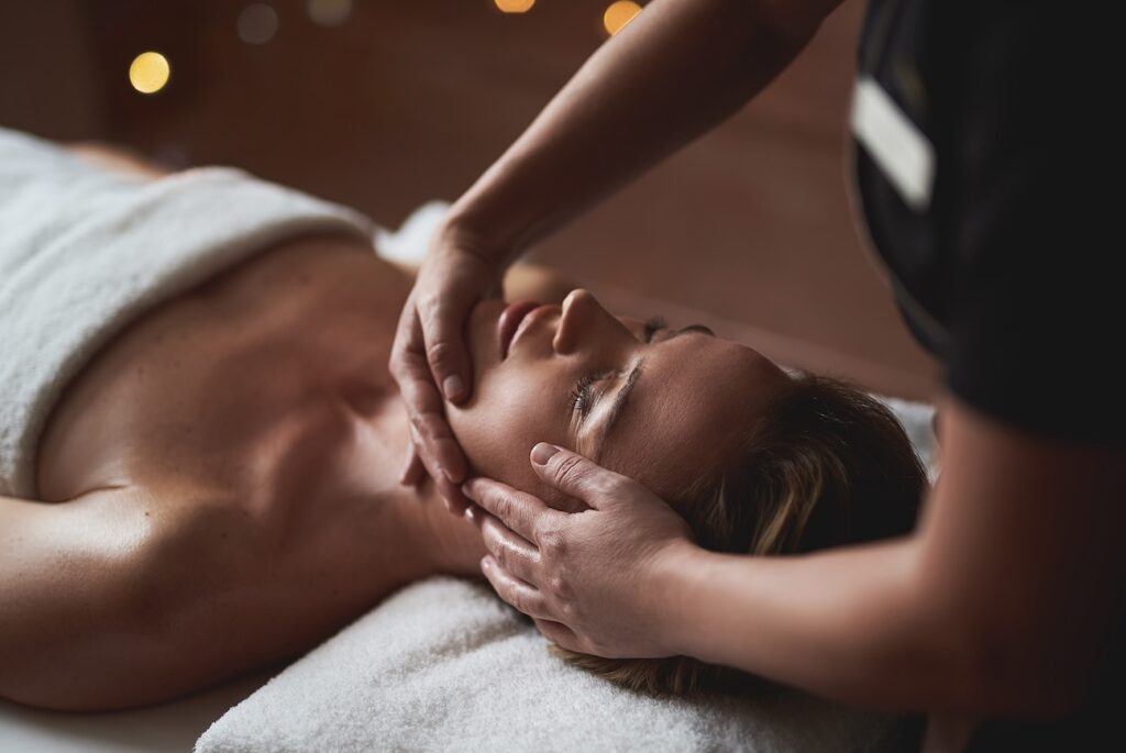 Woman receiving a face massage